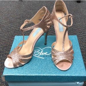 Betsey Johnson Blue T-strap champagne heels.